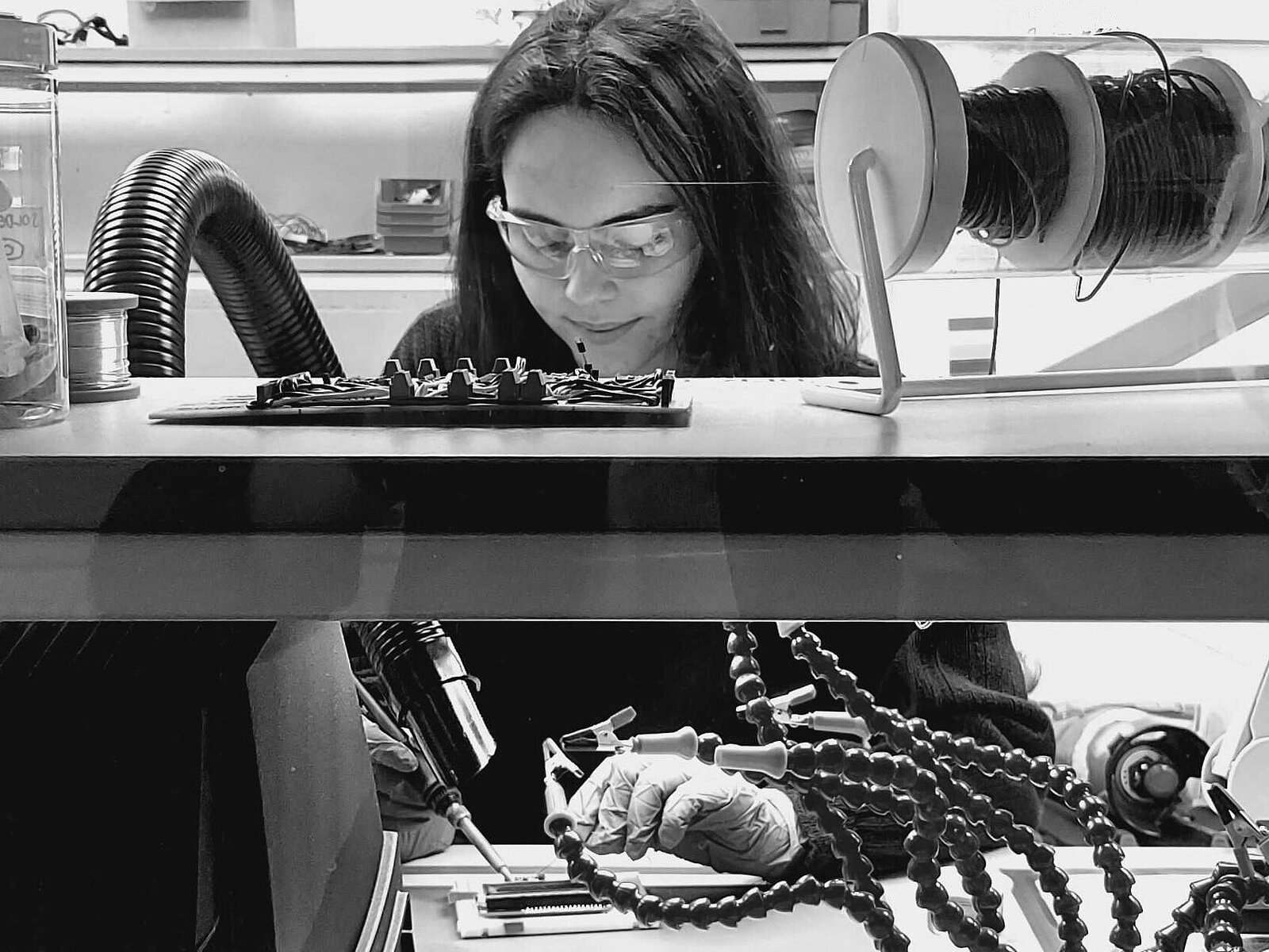 Female engineer Holly Withnell working at Caeli Nova laboratory.